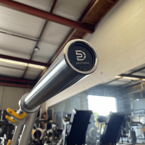 Strength Training Equipment- (300*300)- 220CM 20KG Commercial Standard Olympic bar with view of the outer side of the sleeve