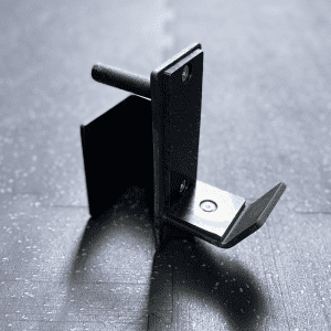 Gym Accessories- Profile view of the J Hook/J Cup for power rack placed on gym floor