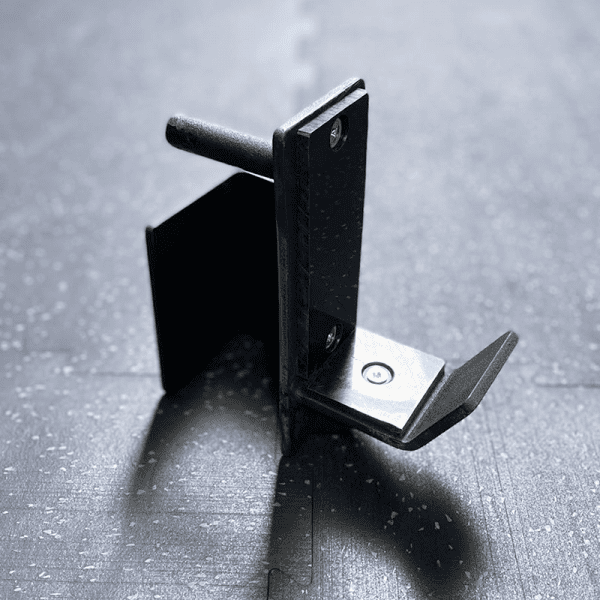 Gym Accessories- Profile view of the J Hook/J Cup for power rack placed on gym floor