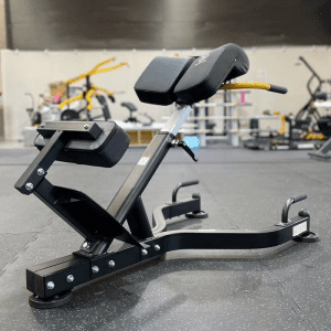 Strength Training Equipment- (300*300)- Profile view of the Roman Chair in gym setting