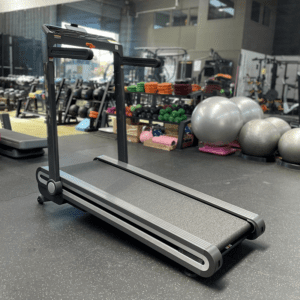 Rent Gym Equipment- (300*300)- Rear Profile view of the Assemble free Foldable treadmill in active position in gym setting