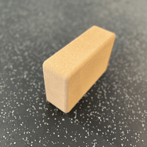 Yoga Product- Cork Yoga Block placed verticaly on longest side on gym floor
