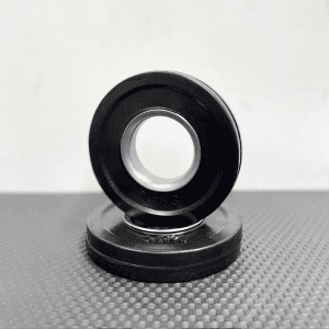 Strength Training Equipment- Pair of 0.5KG Olympic Change plates, one flat and the other vertically placed on top