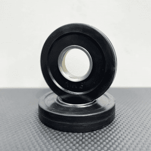 Strength Training Equipment- Pair of 1.0KG Olympic Change plates, one flat and the other vertically placed on top