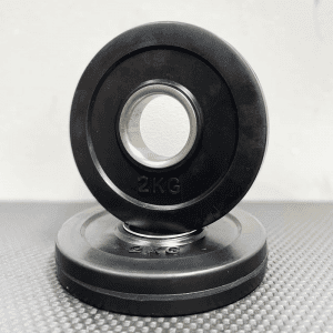 Strength Training Equipment- Pair of 2KG Olympic Change plates, one flat and the other vertically placed on top