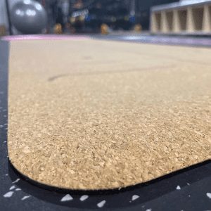 Yoga Product- (300*300)- Low-angle corner view of the Premium Cork Yoga Mat