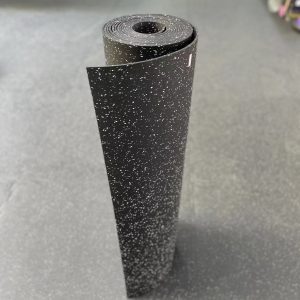 Gym Accessories- (300*300)- Rolled Black Flooring Mat (7000MM*1000MM*5MM) with multi-colour particles visible, placed vertically on gym floor