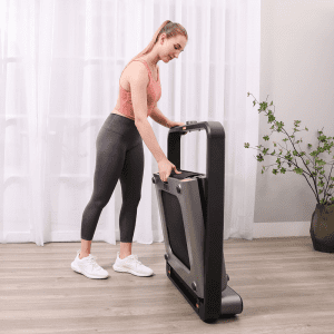Cardio Equipment- Woman folding back the WalkingPad x21 treadmill