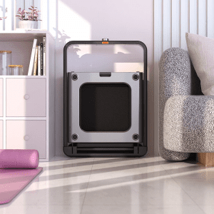Cardio Equipment- WalkingPad x21 treadmill neatly placed between a sofa and cupboard rack