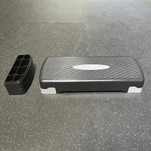 Cardio Equipment- (300*300) Image- Adjustable Aerobic Studio Stepper (Small) with 2 stackable aerobic steps placed on the left seperately